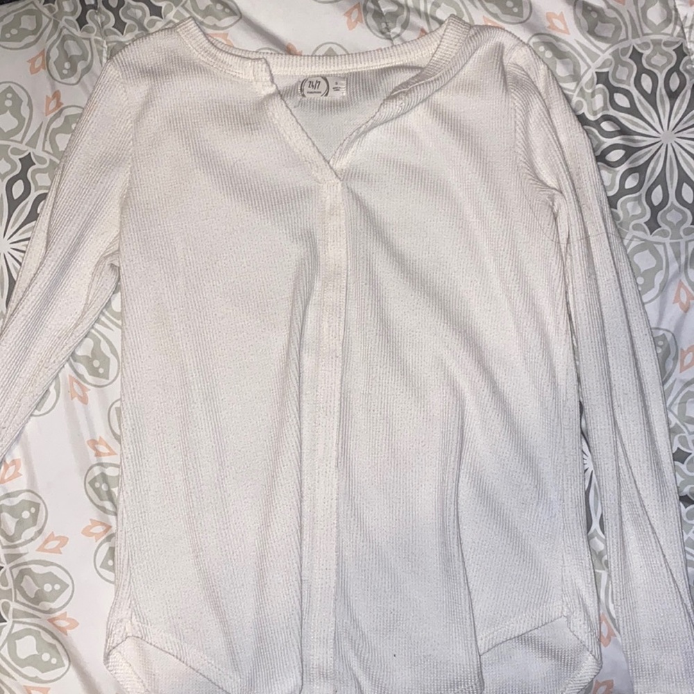 white corduroy sweater